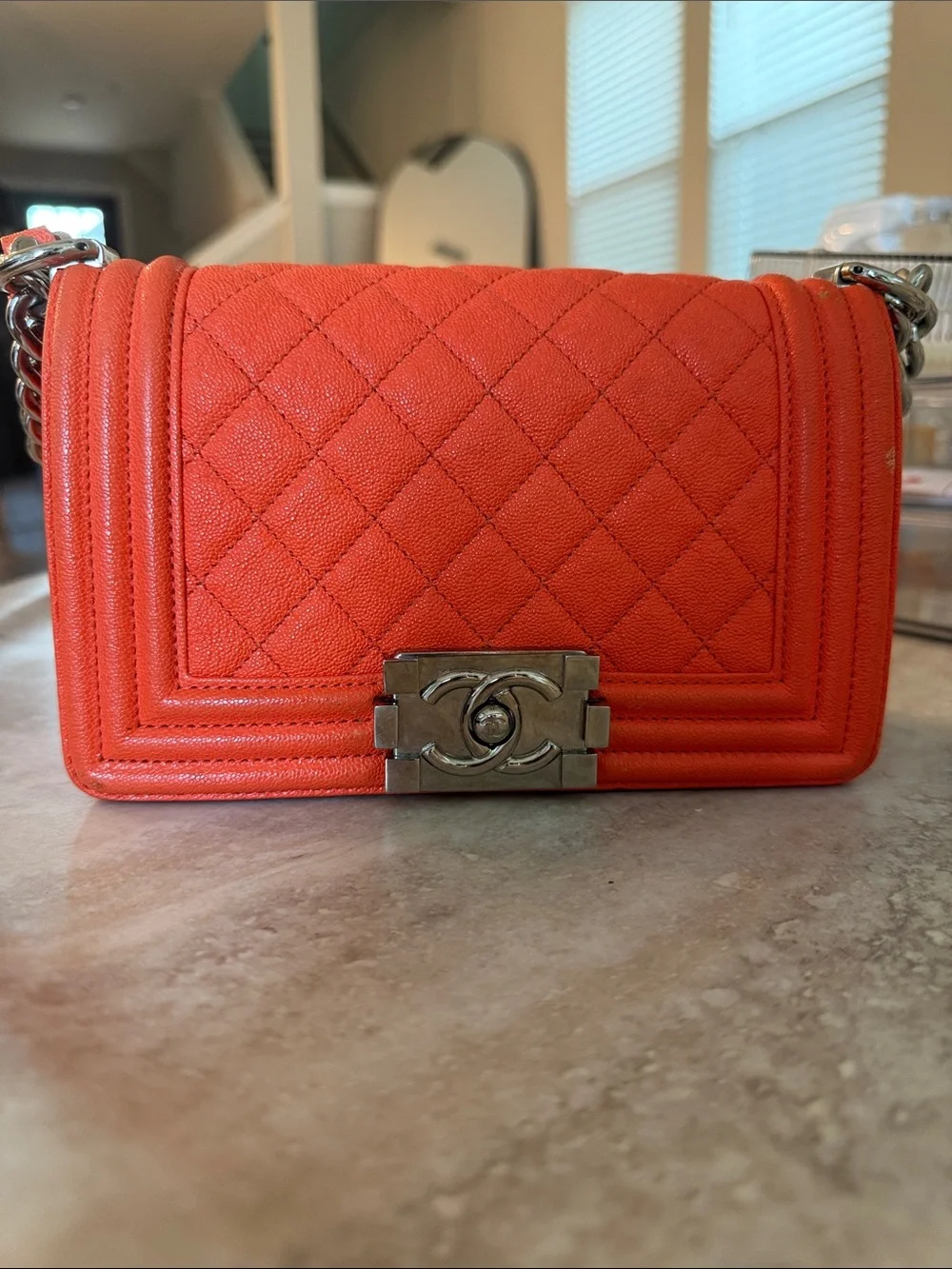 CHANEL Orange Quilted Boy Bag with Silver Chain